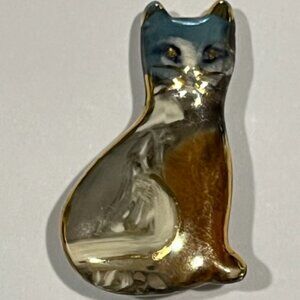 Cat enamel swirl gold gilt accents on ceramic brooch Made in Canada Vtg